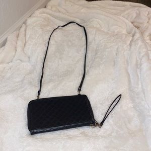 Perfect quilted black wristlet with detachable shoulder strap!